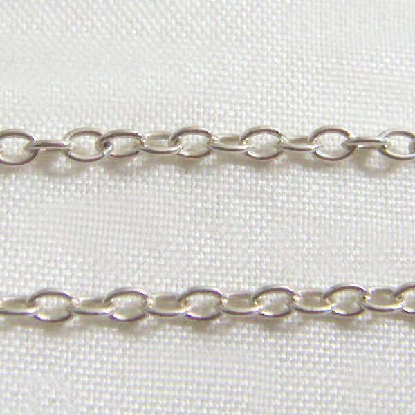 (n1087)Silver choker with little balls and crystal rock.